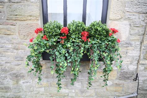 fake flowers for outside window box|artificial flowers for window sill.